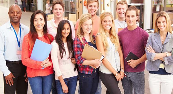 Group of students gather indoors page title graphic.